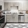 a kitchen with white cabinets