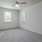 Spacious bedroom with carpet