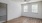 Living area with vinyl wood flooring and big windows