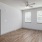 Living area with vinyl wood flooring and big windows