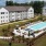 a large building with a swimming pool