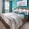 a bedroom with a bed and a desk
